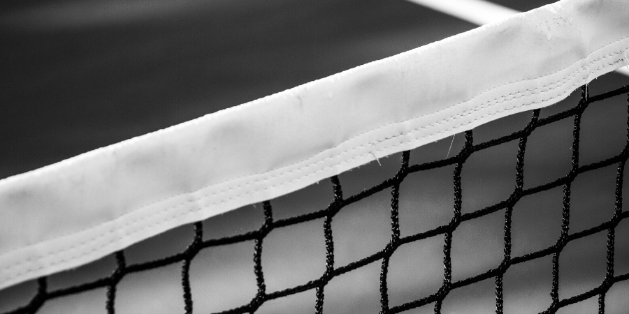 Sports Physiotherapist, Anne Marie Montgomery, stretching female tennis athlete Venus Williams post match.